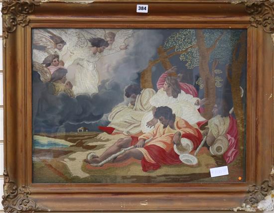 A Victorian silk work panel, worked with angels appearing to the shepherds